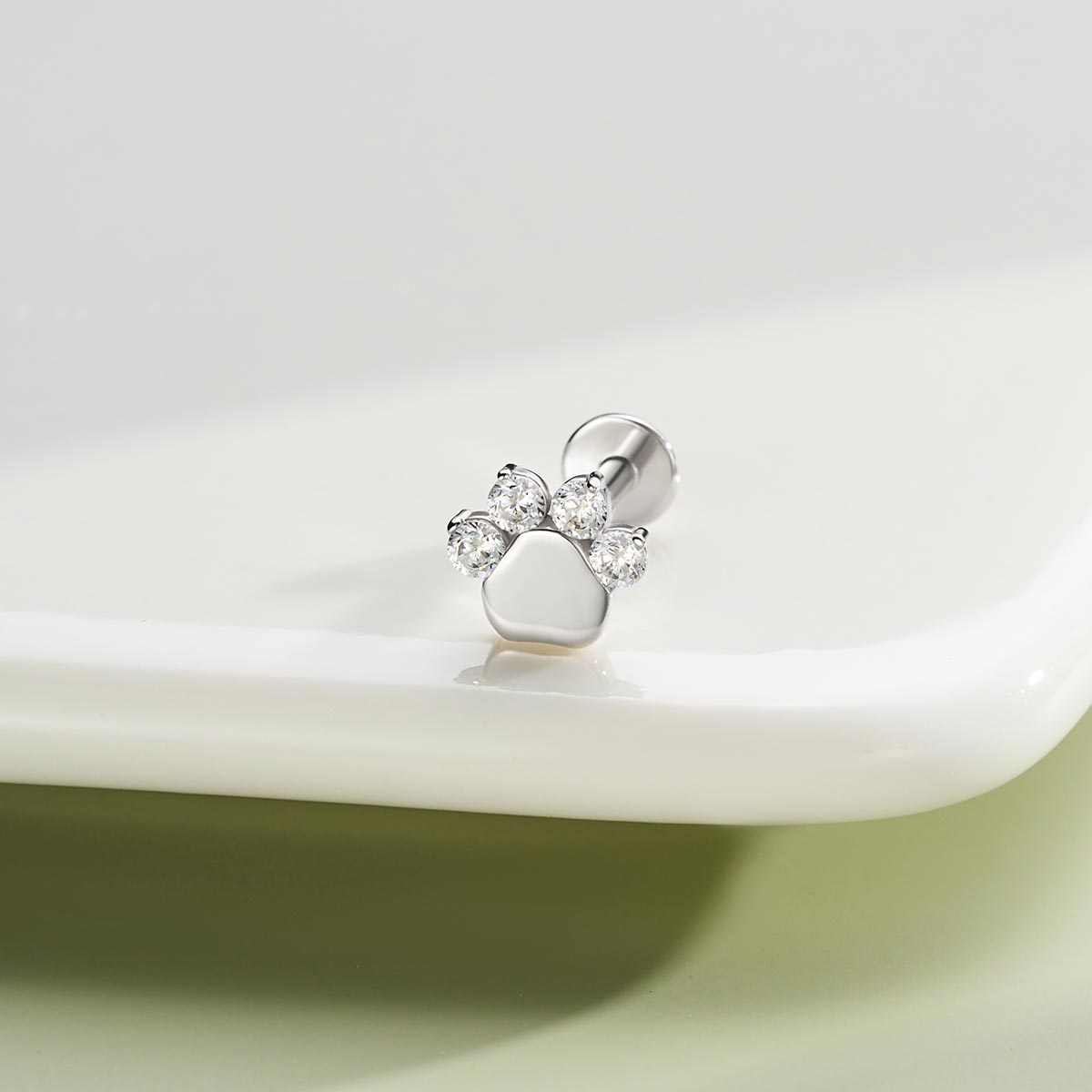 paw print sterling silver helix earrings